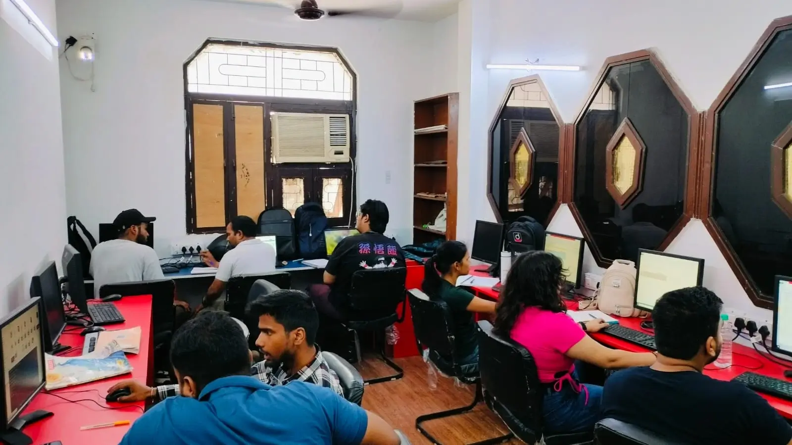 A classroom with students and a teacher